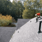 guy on the roof doing repairs