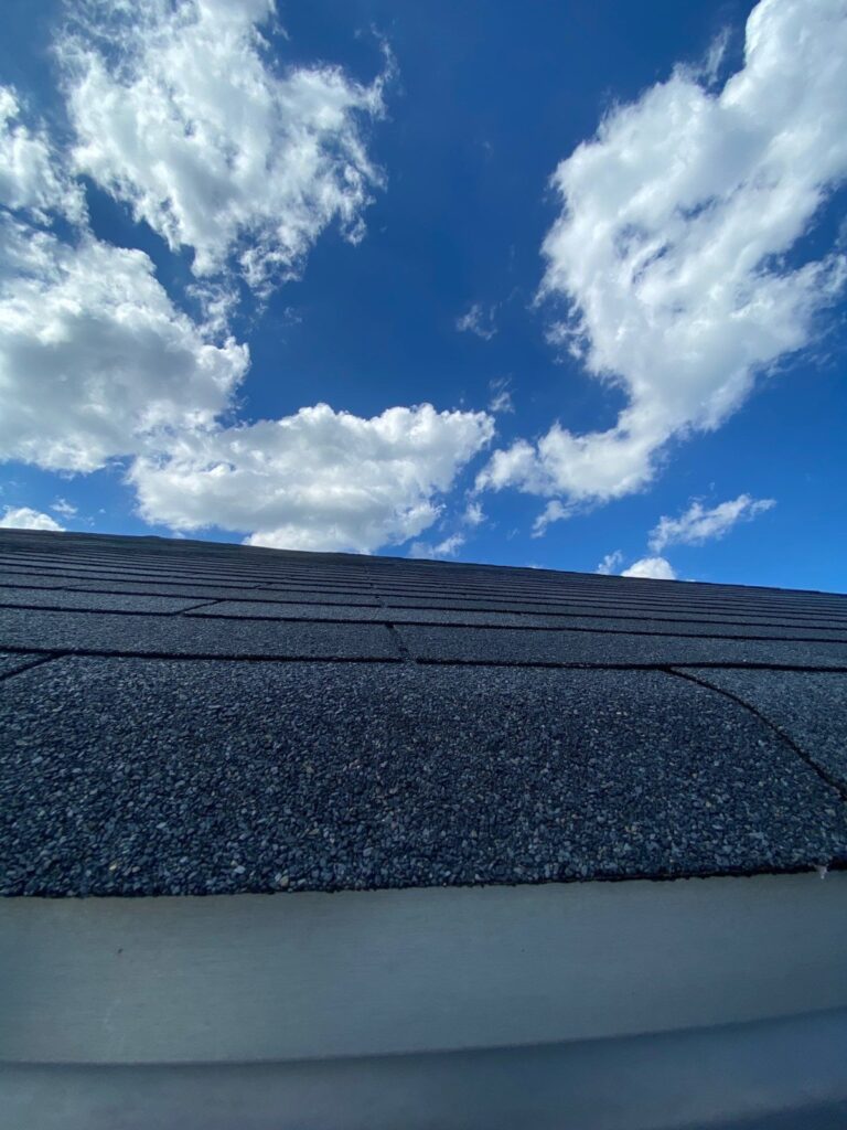 Close-up of shingles during a Braselton, GA roof inspection
