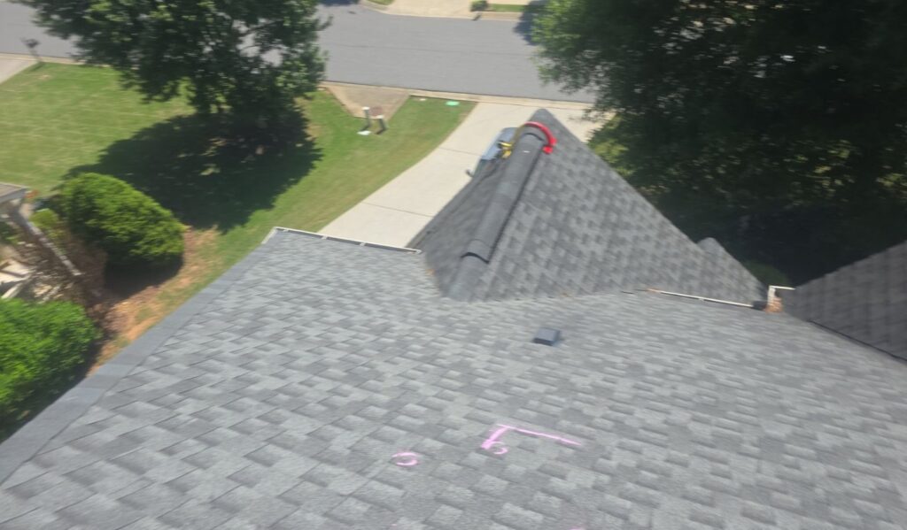Shingle roof inspection on a Cumming, GA home by Emergency Roofing Solutions