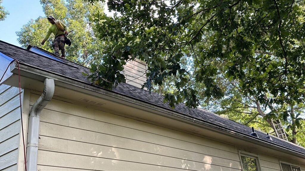 Roofer working on a Dacula, GA home by Emergency Roofing Solutions