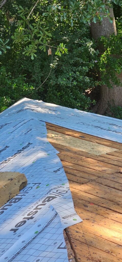 New underlayment over roof decking during a Decatur, GA roof replacement