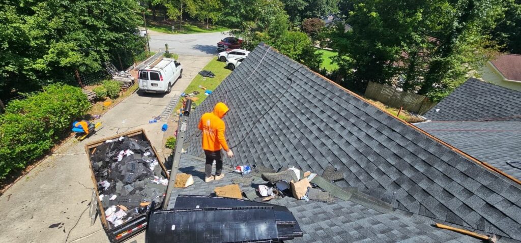 Emergency Roofing Solutions crew replacing a roof in Jonesboro, GA