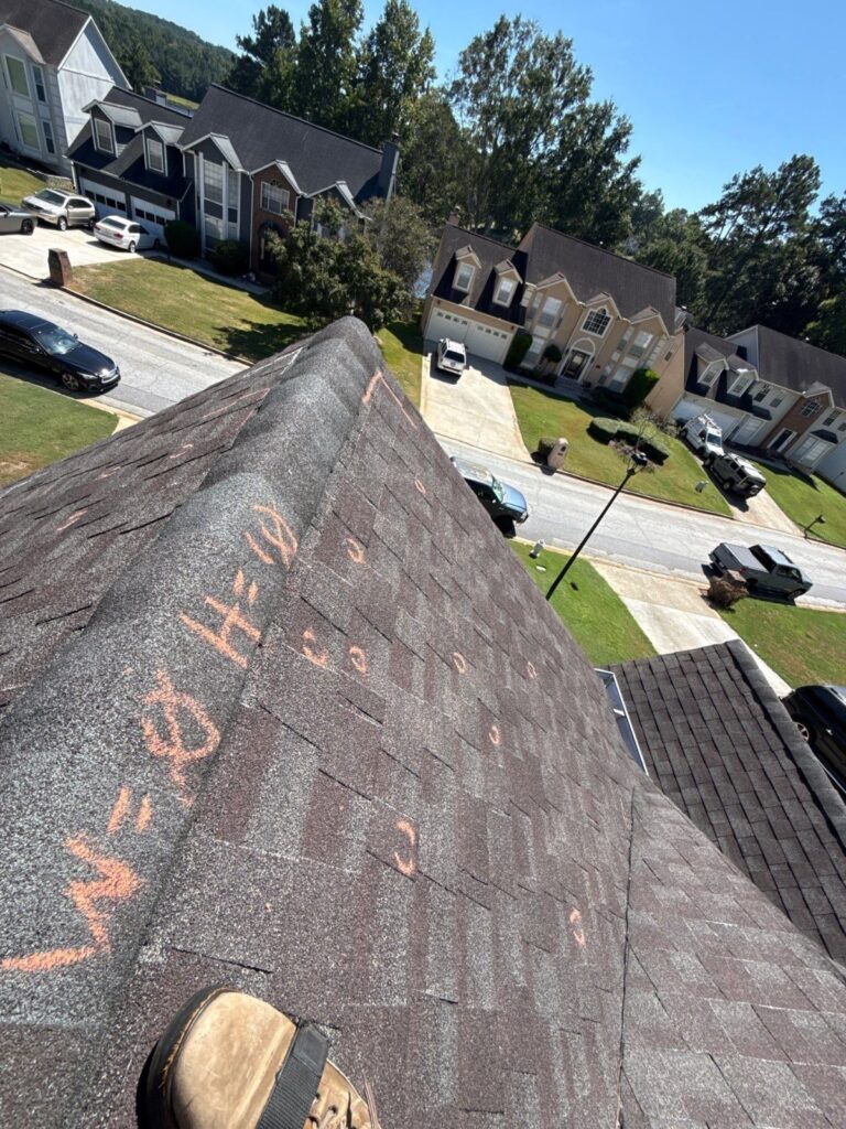 Storm damage test square marked on a Lithonia, GA roof
