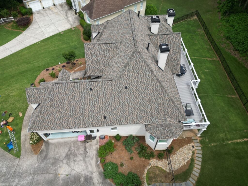 Completed roof replacement in Johns Creek, GA by Emergency Roofing Solutions